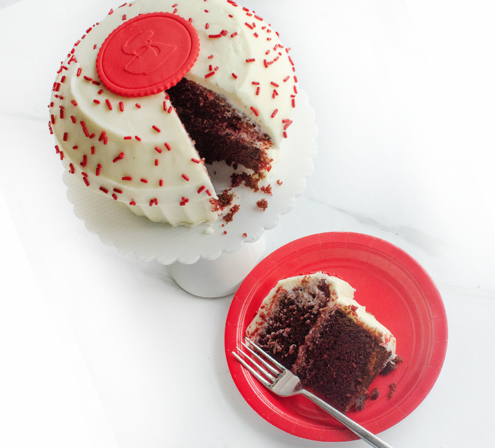 We bake our cupcakes fresh daily. (Shown: Giant Red Velvet cupcakes.)