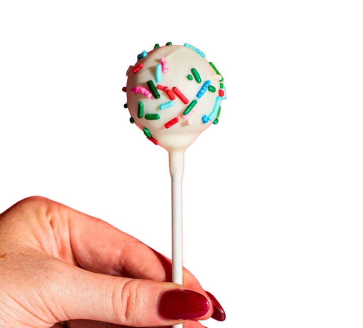 We bake our cupcakes fresh daily. (Shown: Cake Pop- Holiday Confetti cupcakes.)