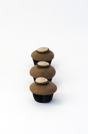 We bake our cupcakes fresh daily. (Shown: Candy Bar cupcakes.)