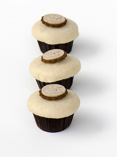 We bake our cupcakes fresh daily. (Shown: Cinnamon  cupcakes.)