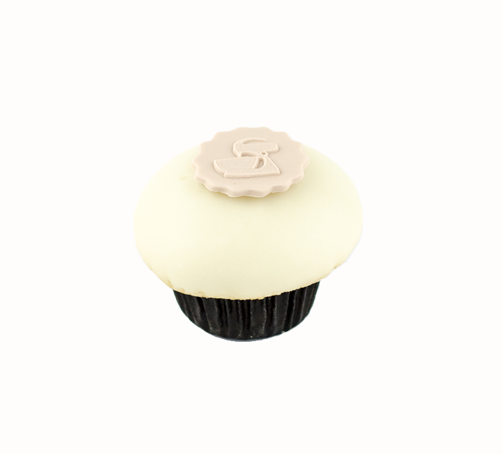 We bake our cupcakes fresh daily. (Shown: Italian Cream  cupcakes.)