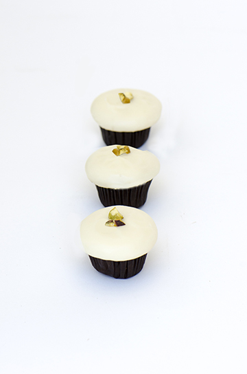 We bake our cupcakes fresh daily. (Shown: Pistachio  cupcakes.)