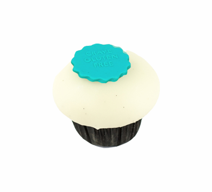 We bake our cupcakes fresh daily. (Shown: Gluten Free Vanilla on Vanilla cupcakes.)